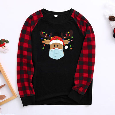 Matching family Christmas pajamas with grey tops, red plaid sleeves, and a reindeer wearing a Santa hat and face mask. - Image 11