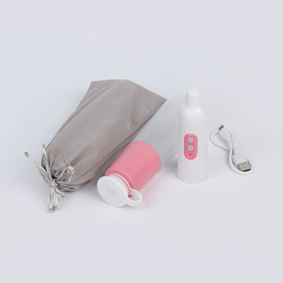 Portable electric bidet with translucent water bottle, white handheld spray unit, USB cable, and grey travel pouch. - Image 5