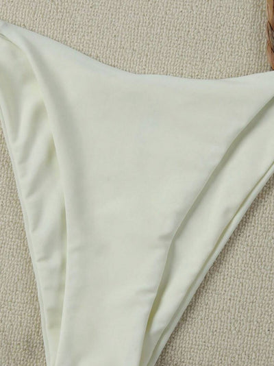 White two-piece bikini with triangle top and tie-side bottom, featuring a gold starfish charm. - Image 2