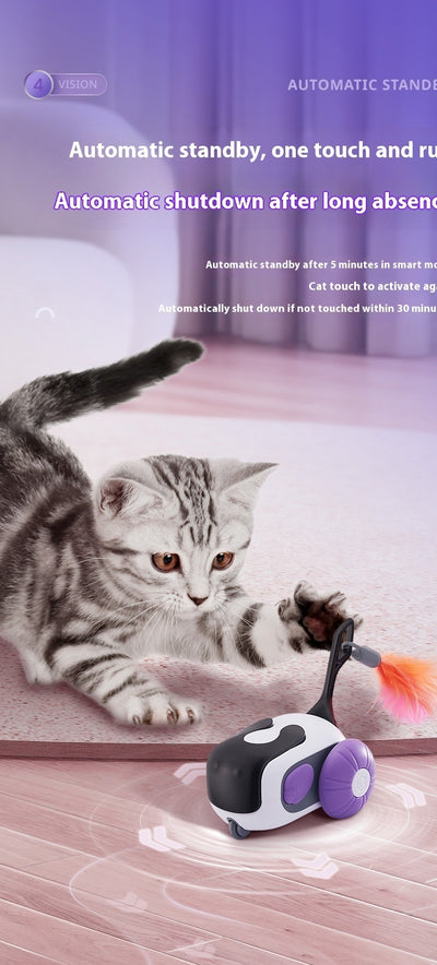 White and black remote control cat toy car with purple wheels and an orange feather, next to a white cat-shaped remote. - Image 12