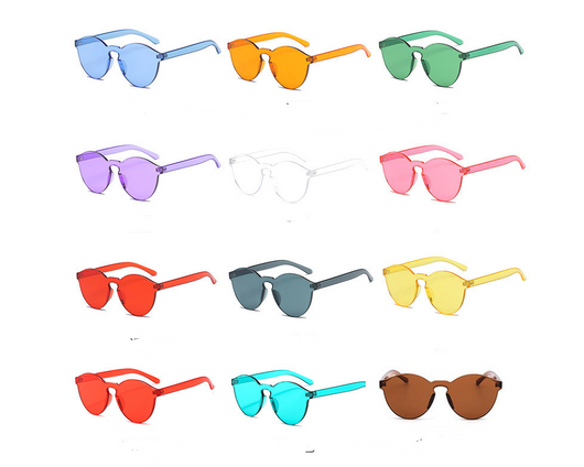 Frameless round brown transparent sunglasses with an integrated design, featuring jelly-like lenses and matching temples.