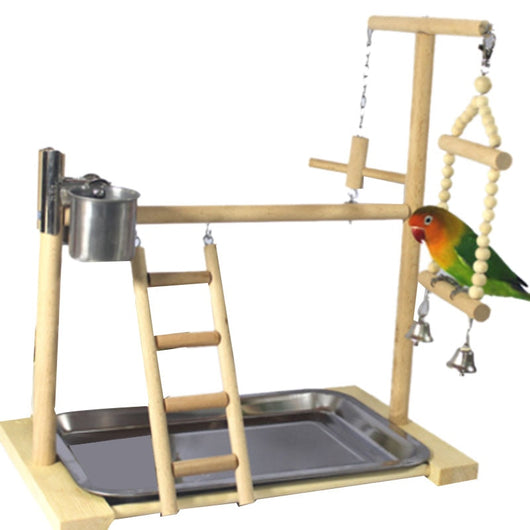 Wooden parrot play stand with perches, ladder, stainless steel food cups, and hanging bells, featuring a lovebird. - Image 2