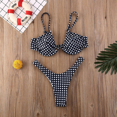 Black and white gingham bikini set with underwire bra top and high-cut thong bottom on a wooden surface. - Image 4