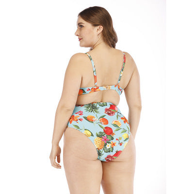 Plus size light blue one-piece swimsuit with tropical fruit and floral print, V-neck, and midriff cutout. - Image 4