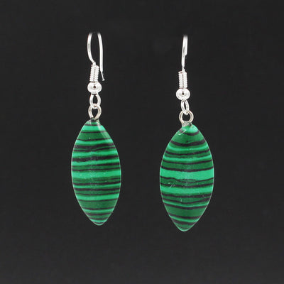 Aretes de Cristal Ojo de Caballo - Diseño Minimalista y Versátil para Mujer