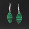 Aretes de Cristal Ojo de Caballo - Diseño Minimalista y Versátil para Mujer