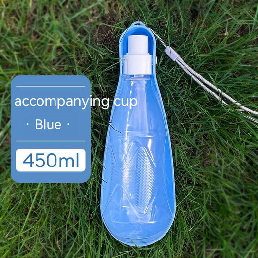 Yellow 450ml portable pet water bottle with a folding drinking trough and white wrist strap, on grass. - Image 6