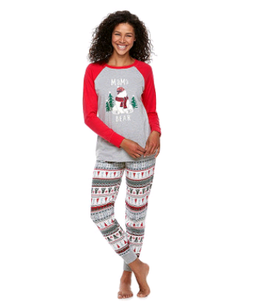 Woman wearing a grey and red 'Mama Bear' Christmas pajama set with a polar bear graphic and fair isle patterned pants. - Image 5