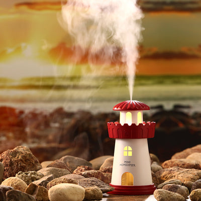 Blue and white lighthouse-shaped mini humidifier with a power button, decorative windows, and a door. - Image 3