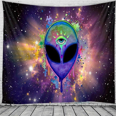 Psychedelic alien head tapestry with an evil eye, colorful paint splatters, and a starry galaxy background.