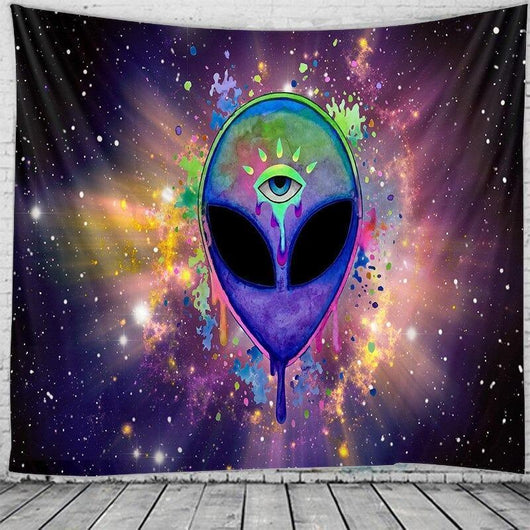 Psychedelic alien head tapestry with an evil eye, colorful paint splatters, and a starry galaxy background.