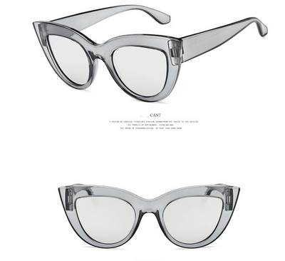 White and black cat eye sunglasses with gradient lenses, featuring a retro style. - Image 9
