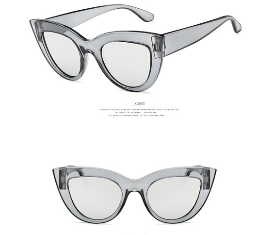 White and black cat eye sunglasses with gradient lenses, featuring a retro style. - Image 9