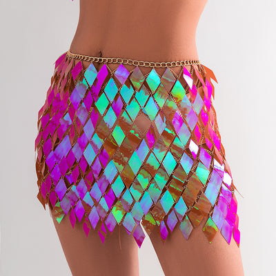 Woman wearing a gold-tone body chain top with iridescent pink and orange diamond-shaped sequins, perfect for beach or festival. - Image 48