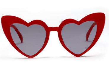 Heart-shaped tortoiseshell sunglasses with light brown lenses on a white background, perfect for women. - Image 6
