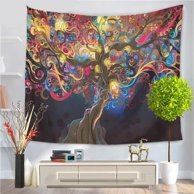 Vibrant abstract tree tapestry with swirling colorful branches in pink, blue, yellow, and orange, hung on a wall.