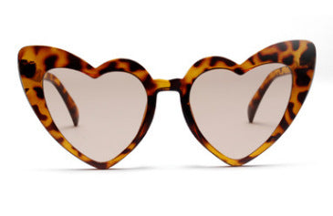 Heart-shaped tortoiseshell sunglasses with light brown lenses on a white background, perfect for women. - Image 3