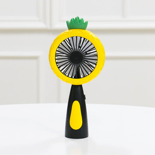 White and lime green children's handheld fan with a round head, small leaf accent, and fruit-like design. - Image 5