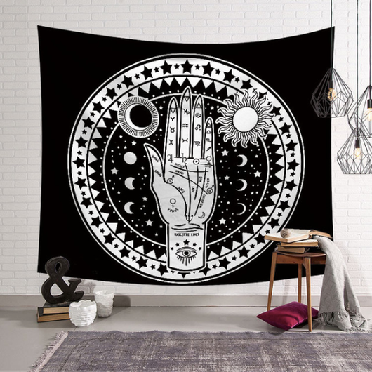 Black and white tapestry featuring a palmistry hand with sun, moon, and stars, perfect for mystical home decor.