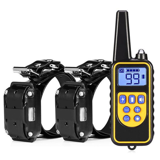 Three electric dog training collars in black, orange, and yellow with receivers, alongside a black and yellow remote control. - Image 2