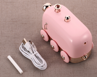 Pink retro mini train ultrasonic humidifier and aroma diffuser with rose gold accents on a white background. - Image 5