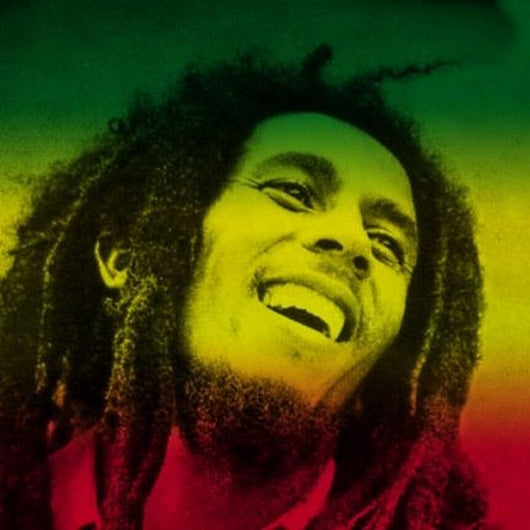 Tapestry featuring a smiling portrait of Bob Marley with dreadlocks against a red, yellow, and green gradient background. - Image 2