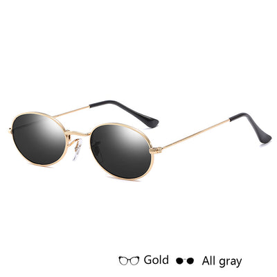 Gold-framed oval sunglasses with black mirror lenses and black temple tips, shown at an angle. - Image 6