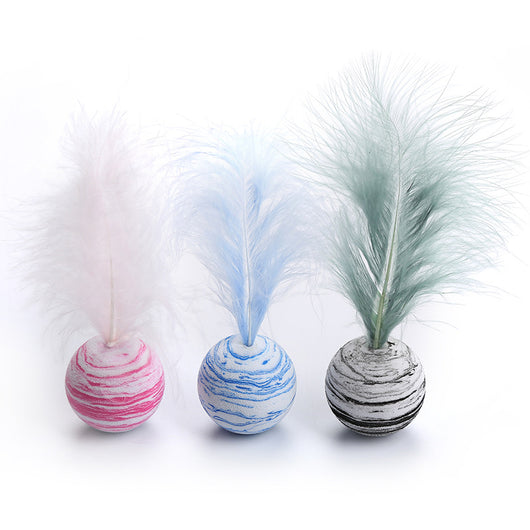 Pink and white marbled pet toy ball with a fluffy white feather on top, designed for cats and dogs. - Image 9