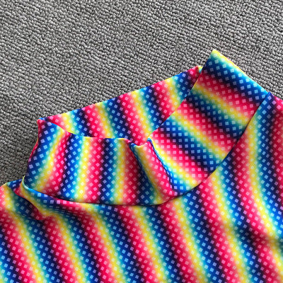 Three-piece rainbow striped bikini suit with triangle top, thong bottom, and long-sleeved cropped cover-up. - Image 4