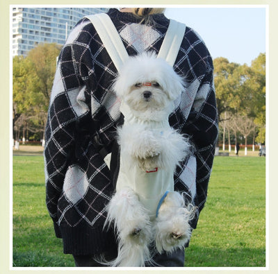 Denim blue pet carrier backpack with open head and leg holes, featuring breathable mesh and a front pocket. - Image 16