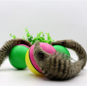 Green and pink two-tone ball with a furry gray beaver-like pet toy on a white background. - Image 4