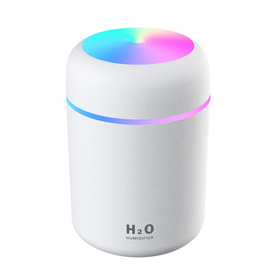 Dark gray ultrasonic aromatherapy essential oil diffuser with a colorful LED light band and rainbow top light. - Image 11