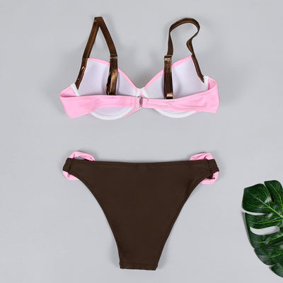 Women's two-piece swimsuit with a pink pleated bandeau top and brown bikini bottoms with pink accents, by the ocean. - Image 17