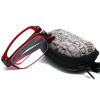 Two pairs of folding anti-blue light reading glasses, one brown and one black, partially folded on a white surface. - Image 9
