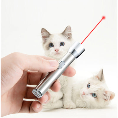 Silver stainless steel laser pointer pet toy with a grey wrist strap, resting on a white computer keyboard. - Image 5