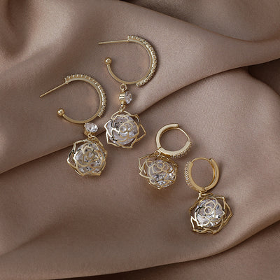 Aretes de Circonio Hueco con Incrustaciones Brillantes y Zirconia Rosa - Image 3