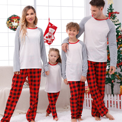 Family of four wearing matching red and black buffalo plaid Christmas pajamas with white and grey raglan tops. - Image 2