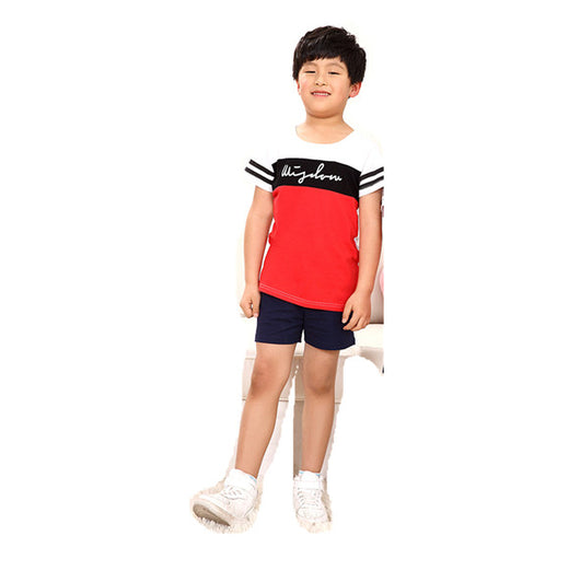 Young girl in a white short-sleeve t-shirt with a black stripe and black shorts, wearing a black cap. - Image 11