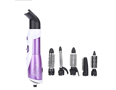Seven-in-one hair dryer set with white and purple main unit and multiple black styling attachments in an open box. - Image 3