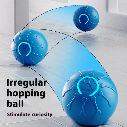 Orange smart jumping ball pet toy with bone and paw print details, featuring a glowing paw print.