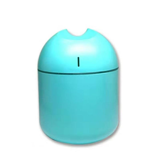 Pink aromatherapy humidifier with a minimalist design and a single mist outlet. - Image 7