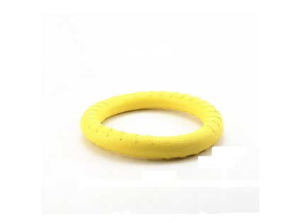 Bright yellow EVA pet ball dog toy with textured grooves and paw print details for interactive play. - Image 11