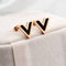Aretes en V Negro Elegante
