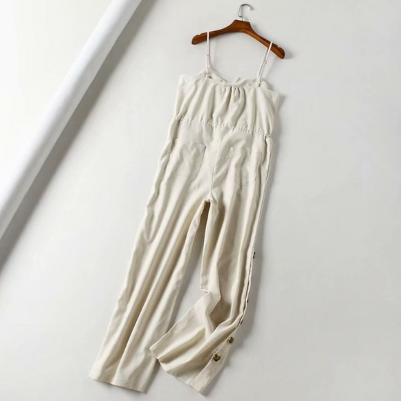 Pantalón de una pieza con botones en bolsillos