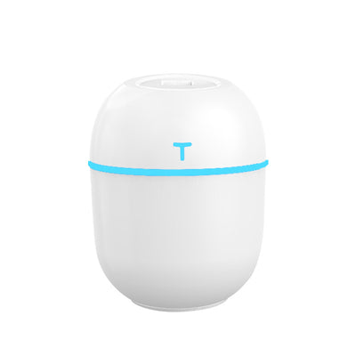 Teal egg-shaped USB humidifier with a glowing blue light band and a 'T' shaped indicator on top. - Image 12