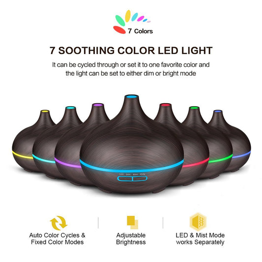 Wood grain ultrasonic aromatherapy diffuser and humidifier with a glowing blue LED light band and control buttons. - Image 2