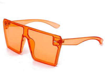 Oversized flat-top sunglasses with translucent red plastic frames and matching red lenses on a white background. - Image 12