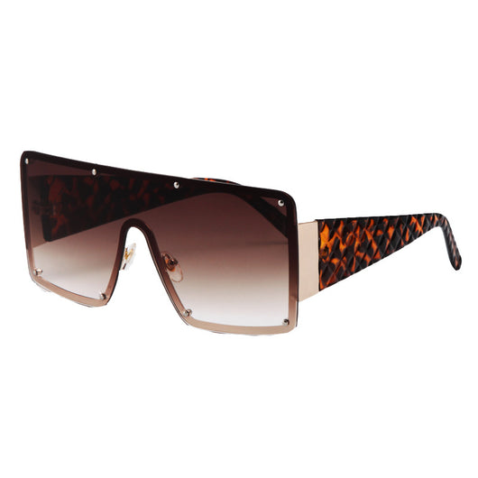Oversized square frame sunglasses with brown gradient lenses and tortoise shell arms featuring a textured diamond pattern. - Image 12