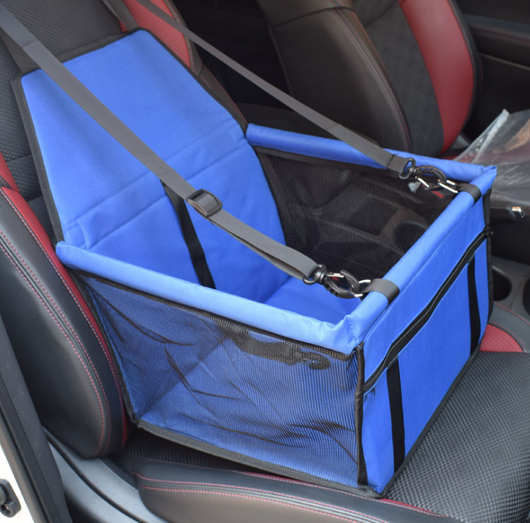 Light grey pet car booster seat with black mesh sides and adjustable straps, installed on a black and red car seat. - Image 8
