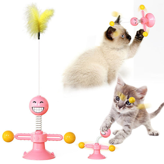 Yellow cat turntable windmill toy with a smiling face, spring, rotating arms, and a feather wand. Two kittens play with the toy. - Image 3